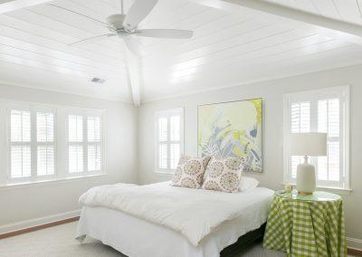 Owner suite addition with vaulted ceiling, fan and lots of natural light.