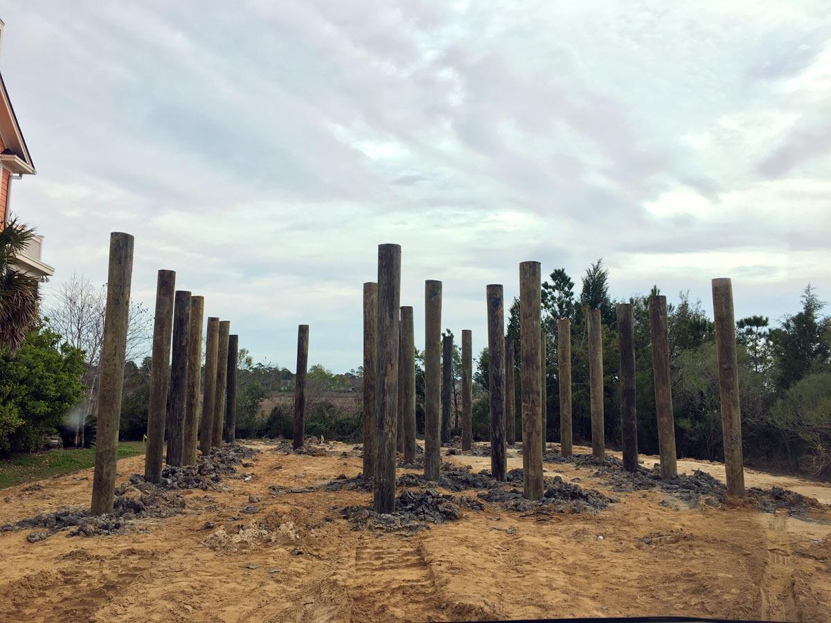 Pylons set before construction begins on marsh front custom home.